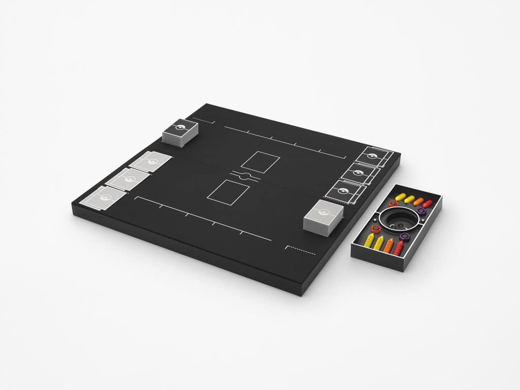 A classic board game with a black, rectangular board adorned with white lines and symbols. It includes cards, colored pegs, and a circular component on the side, reminiscent of the Pokémon Trading Card Game, all set against a sleek white background.